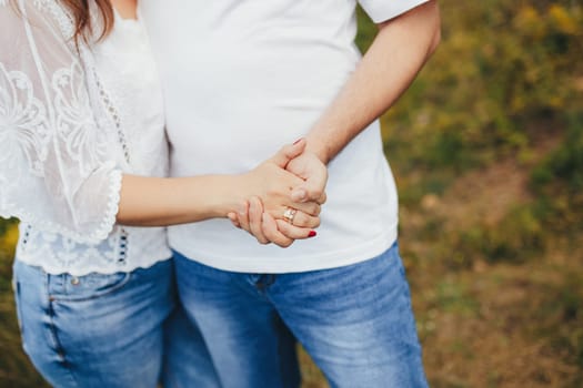 Lovely couple outdoor has romantic photo session. High quality photo