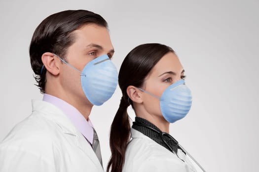 Doctors wearing flu masks