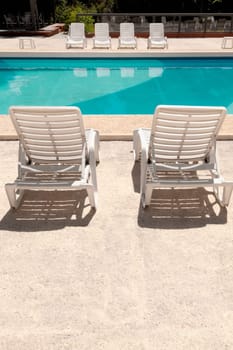 Lounge chairs at the poolside