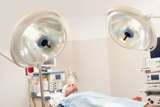 Patient lying on an operation table