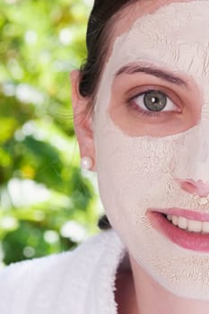 Woman with facial mask on her face