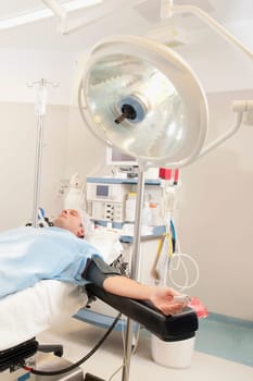 Patient lying on an operation table
