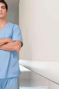 Surgeon standing in the corridor of a hospital