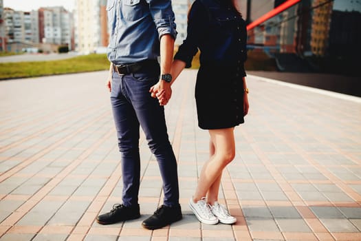 Lovely couple outdoor has romantic photo session. High quality photo