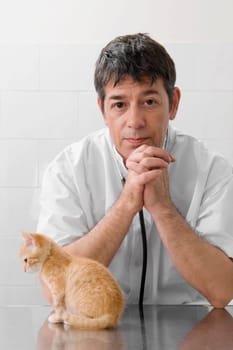 Portrait of a vet with a cat