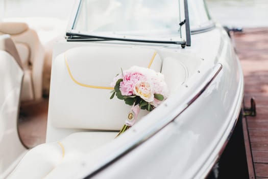 Luxury wedding bouquet in the white boat. High quality photo
