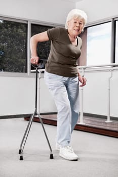 Disabled woman walking with a cane