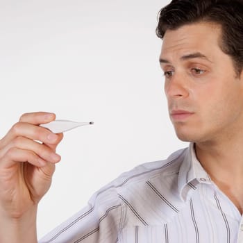 Man reading a thermometer