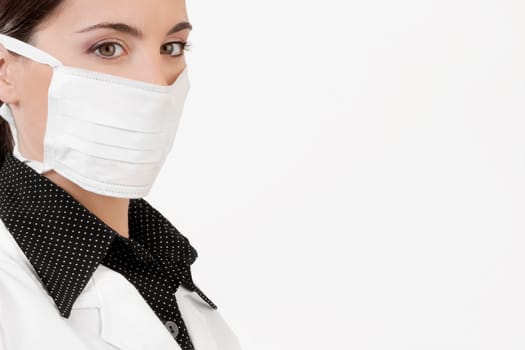 Female doctor wearing a flu mask