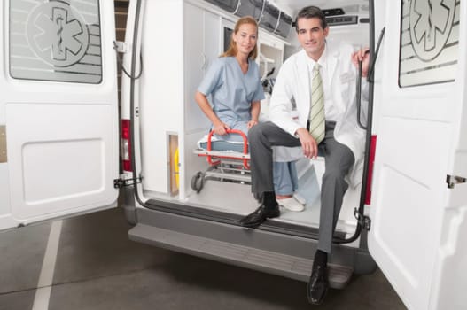 Doctor with a female nurse in an ambulance