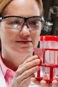 Female doctor holding medical samples in a laboratory