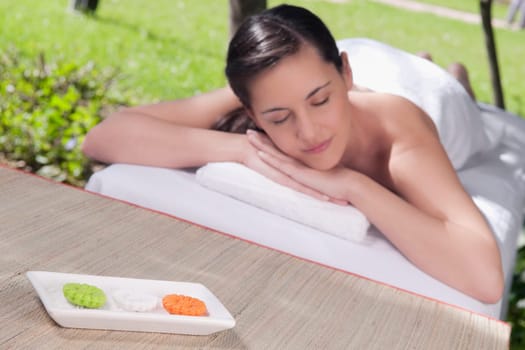 Woman lying on a massage table