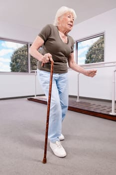 Woman walking with a cane
