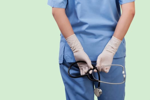 Female surgeon holding a stethoscope