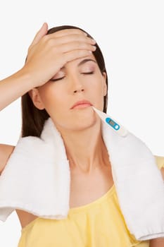 Woman taking her temperature