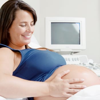Close_up of a pregnant woman smiling