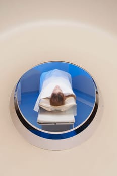 Patient going through an MRI scan