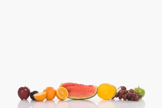 Assorted fresh fruits in a row