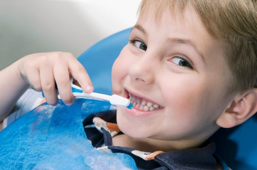 Boy brushing teeth