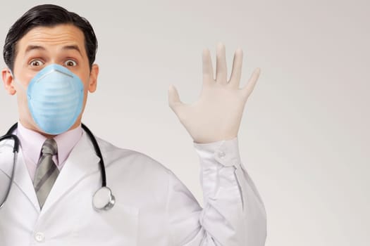 Doctor wearing a flu mask and gesturing
