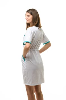 Side view of girl in white medical coat, isolated on white background