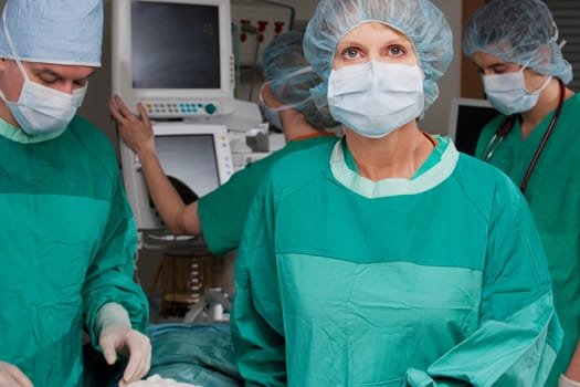 Surgeons in an operating room