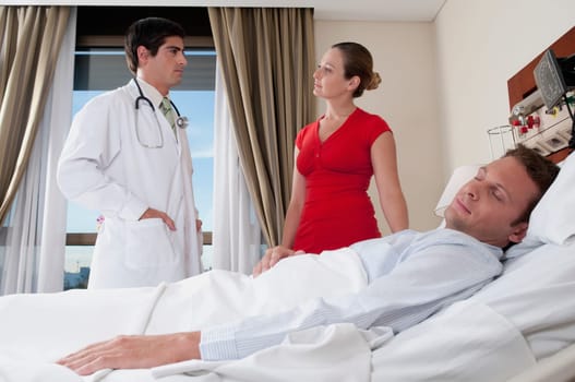 Woman discussing with a doctor