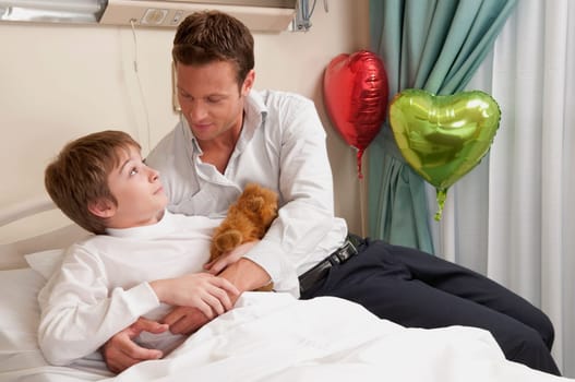 Father with his son in a hospital