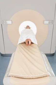 Patient going through an MRI scan