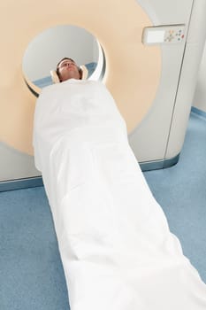 Patient going through an MRI scan