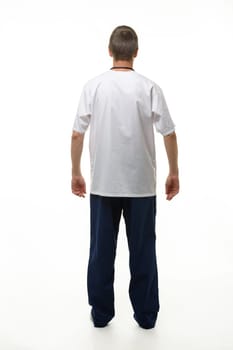 Man showing doctor's clothes, back view, isolated on white background