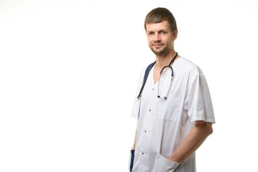 Portrait of a doctor male forty years old, isolated on white background