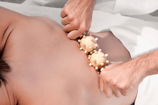 Man receiving acupressure treatment