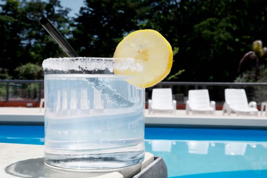 Glass of lemonade at the poolside