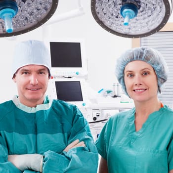 Portrait of two surgeons smiling