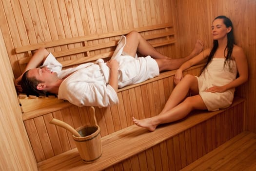 Couple taking a sauna bath