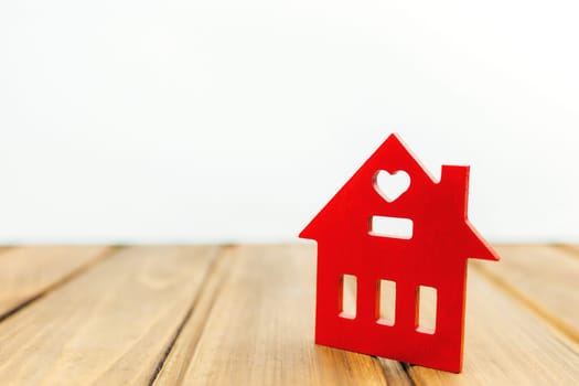 Little wooden red house on the background. High quality photo