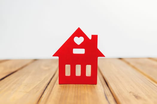 Little wooden red house on the background. High quality photo