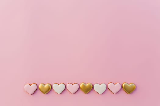 Pink background with sweet gingerbread heart cookies. High quality photo