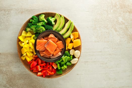 Cooking healthy meal with salmon steak and mixed vegetables. Healthy cooking concept