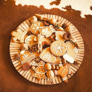 Liver on a wooden plate. cow skin on the table.