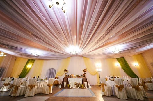 Empty banquet hall, ready to host the celebration.