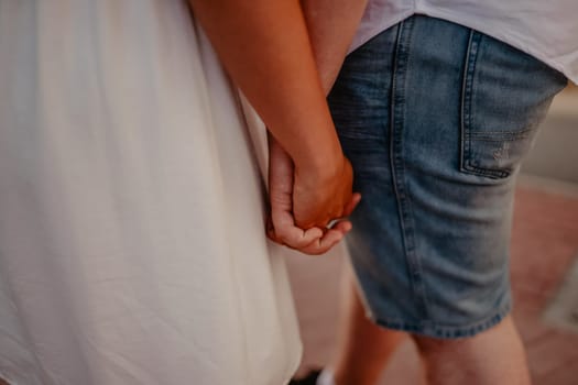 the guy and the girl held hands. love and friendship.