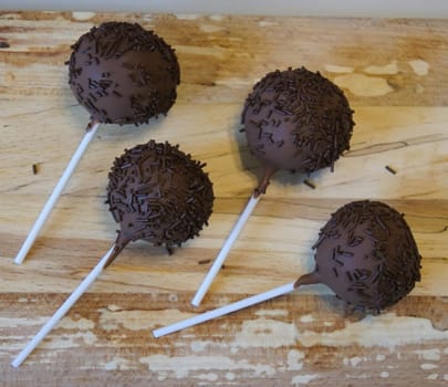 Ice cream in chocolate glaze in the form of chupa chupa chupa.