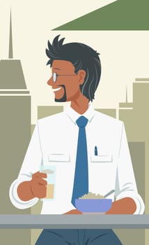 Young man sitting at a cafe holding a cup of coffee