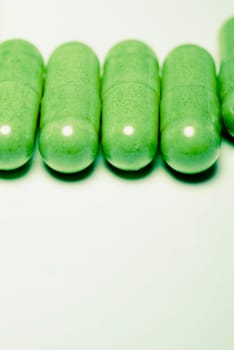 Close_up of capsules in a row