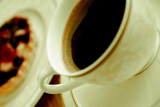 Close_up of a tea cup with a saucer