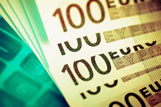 Close_up of European union banknotes and a calculator