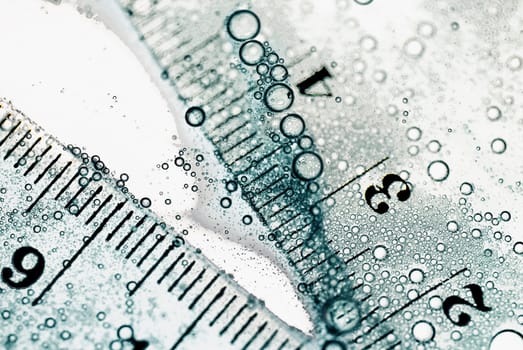 Close_up of two rulers