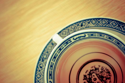 Close_up of a tea cup with a saucer
